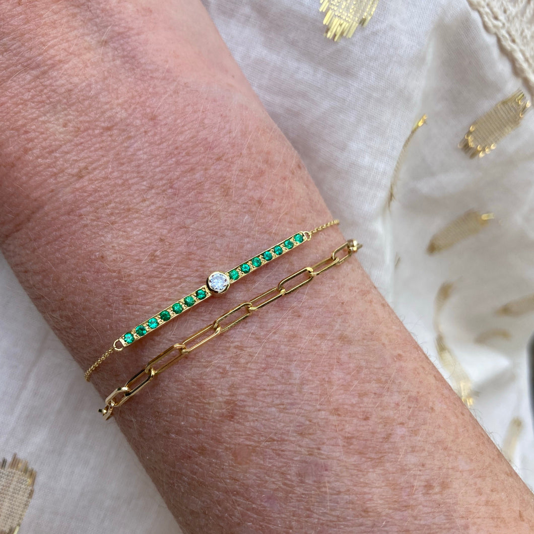 Hawaii bracelet with emeralds and a diamond
